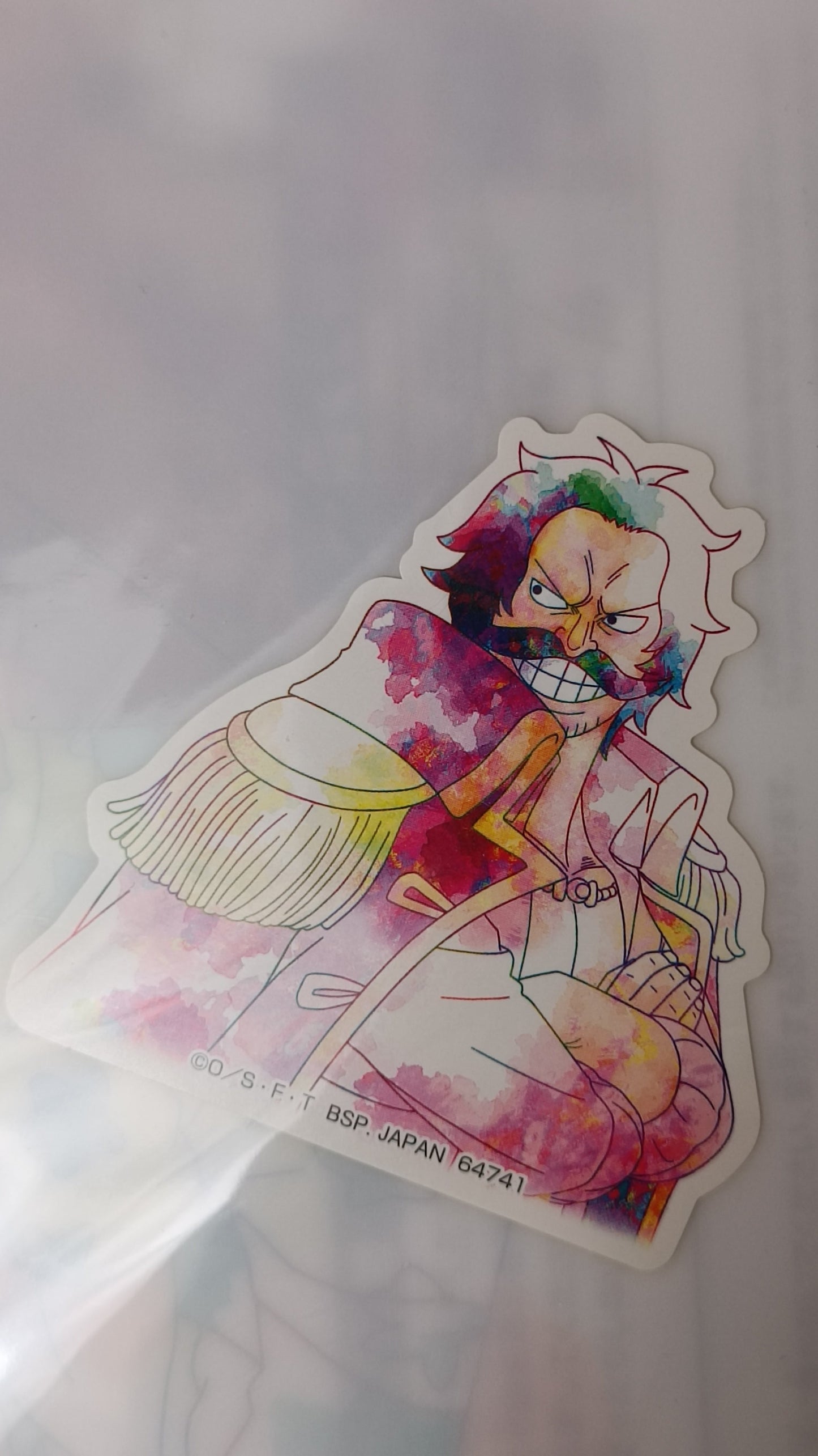 Cartoon character sticker with colorful design on a white background