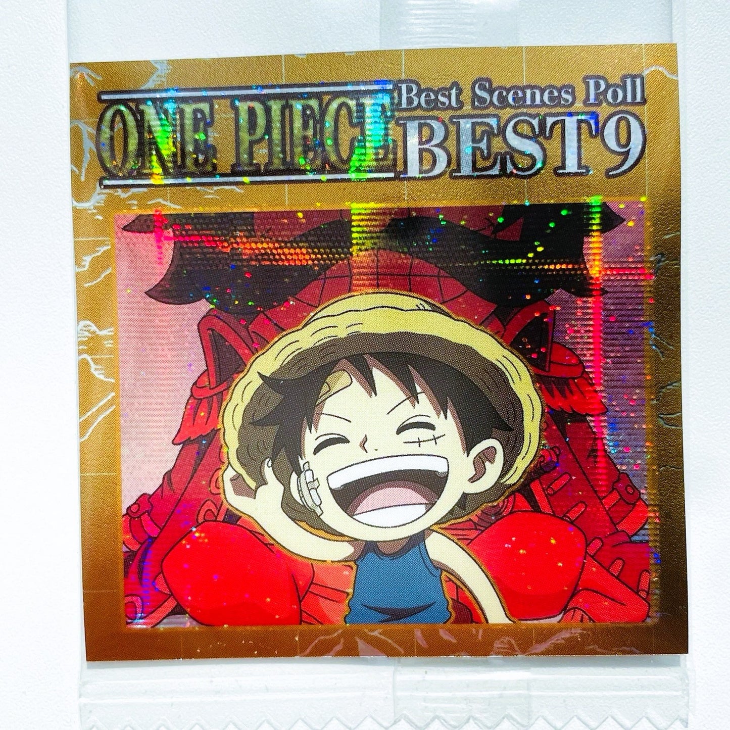 Card featuring a character from 'One Piece' with a gold border and text.