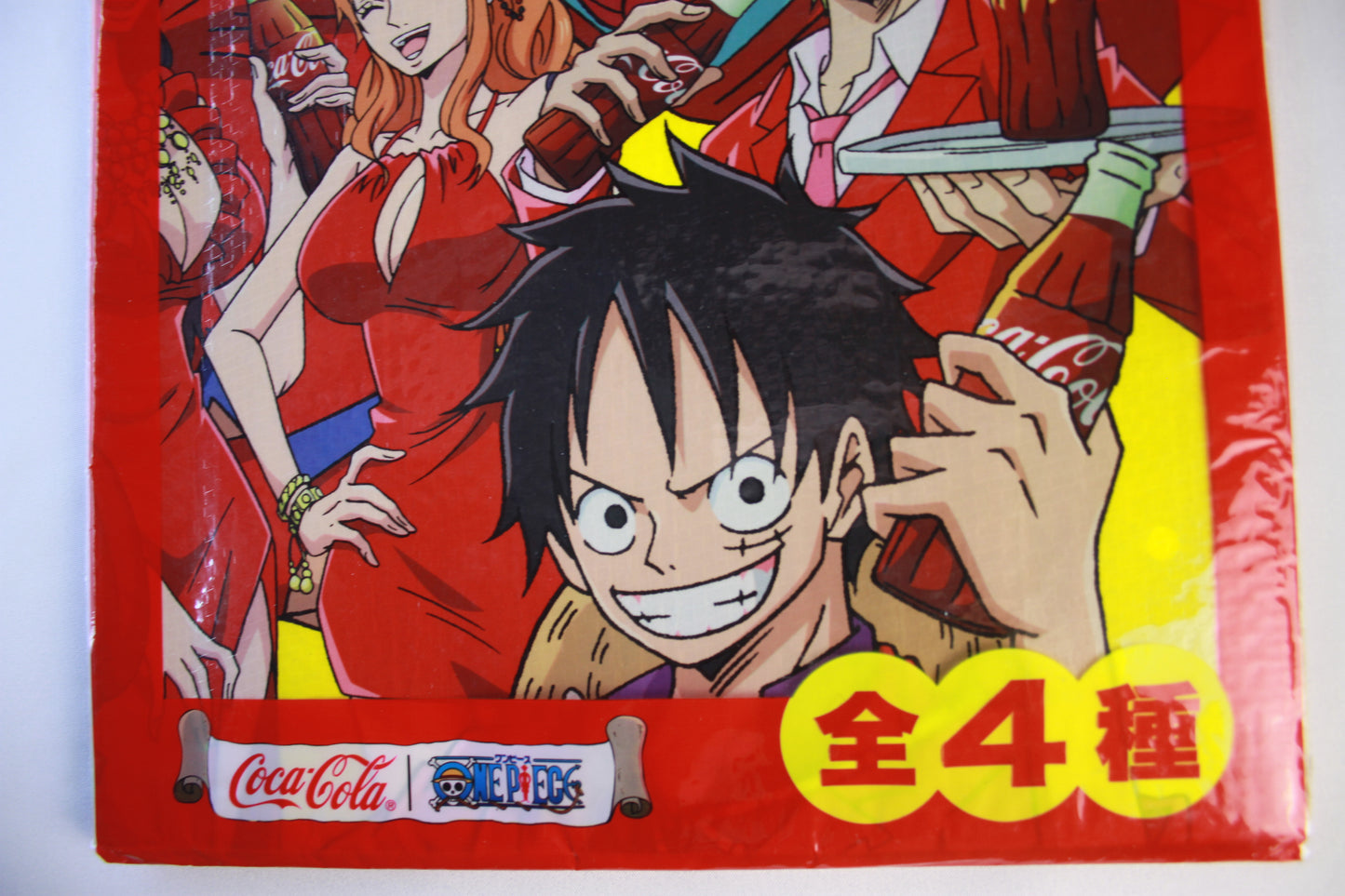 Coca-Cola product packaging featuring an animated character with a red background