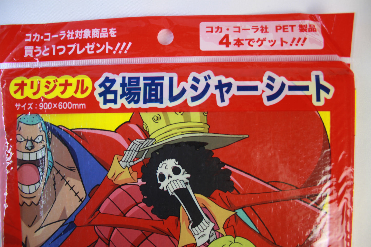 Packaging with an animated character on a red background