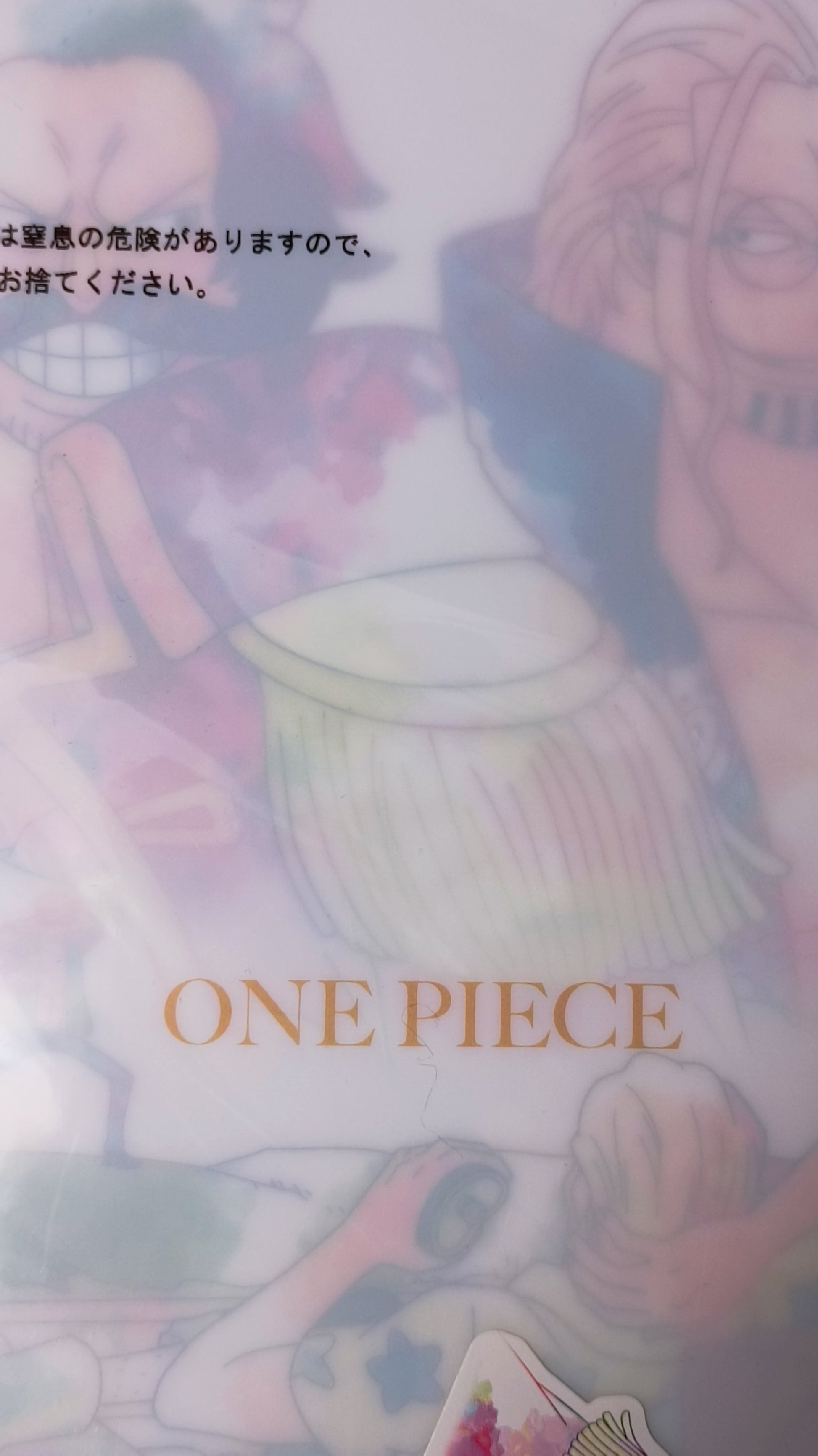 Cover of 'One Piece' with colorful illustrations and text.
