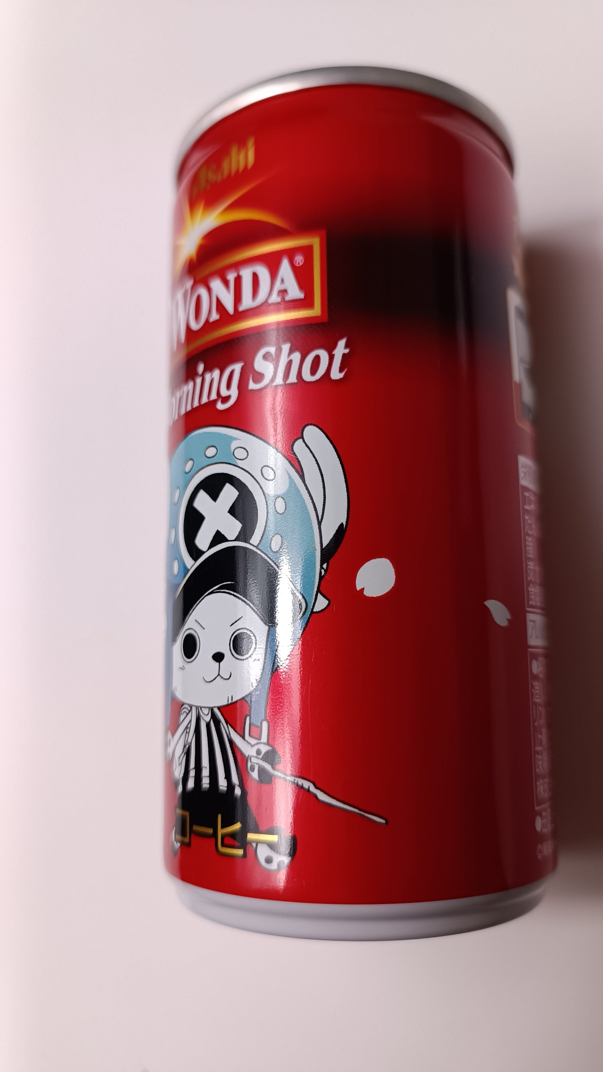 Red can with a cartoon character on a white background