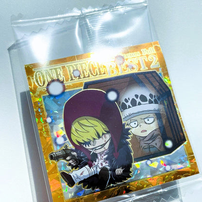 Card featuring characters from 'One Piece' in a clear packaging on a white background