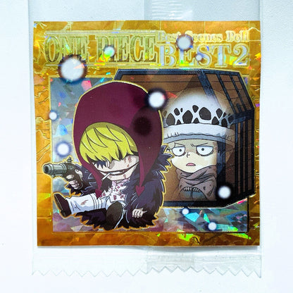 Card featuring two animated characters with 'One Piece' branding on a gold and blue background.