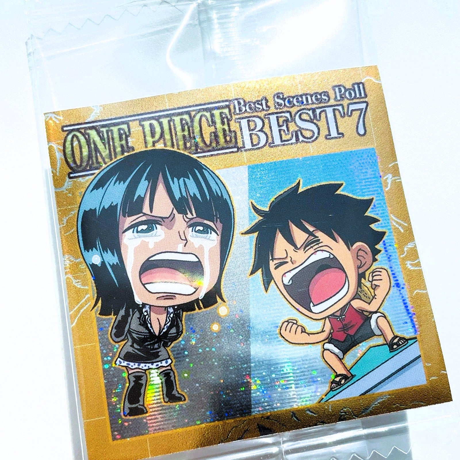 Packaging of 'One Piece Best Scenes Poll BEST 7' with anime characters on a clear background